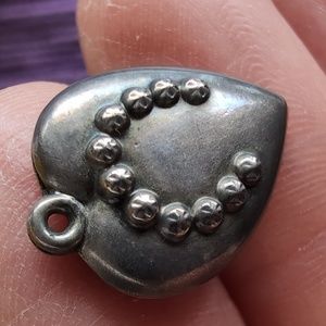 Antique sterling silver puffed heart charm